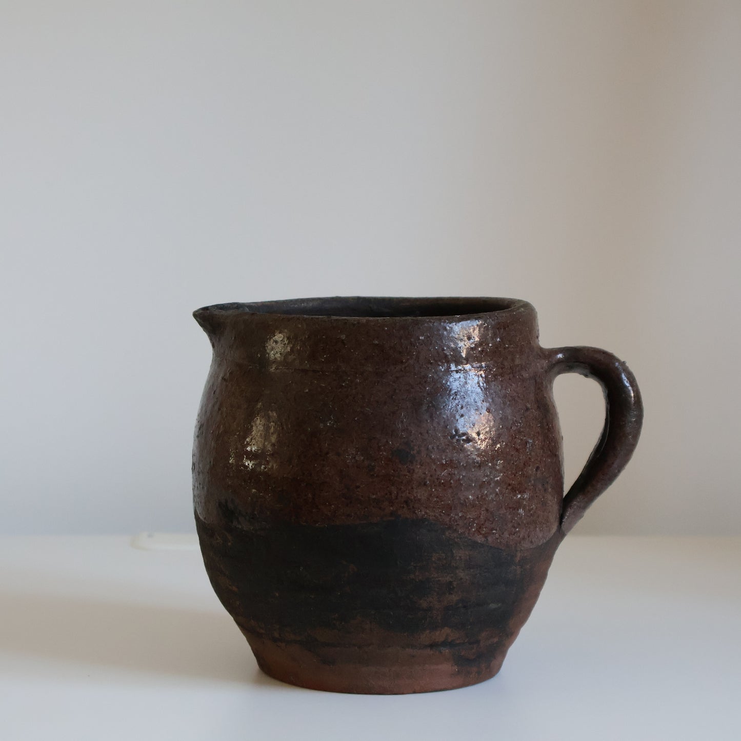 Textured half glazed jug