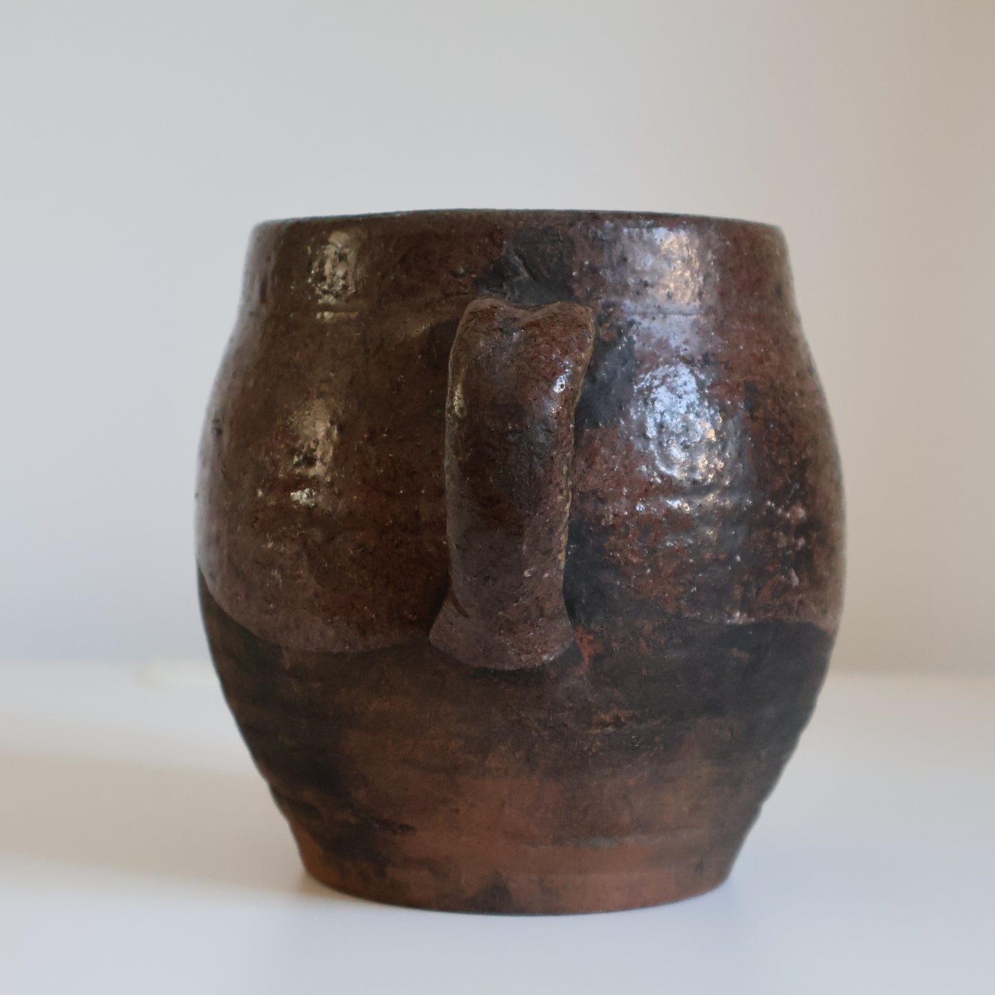 Textured half glazed jug