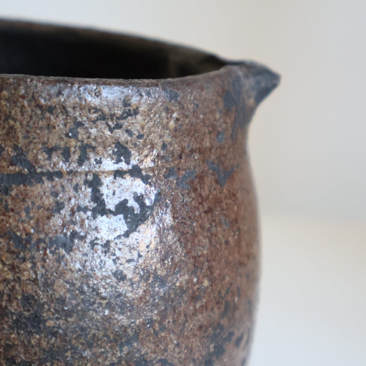 Textured half glazed jug