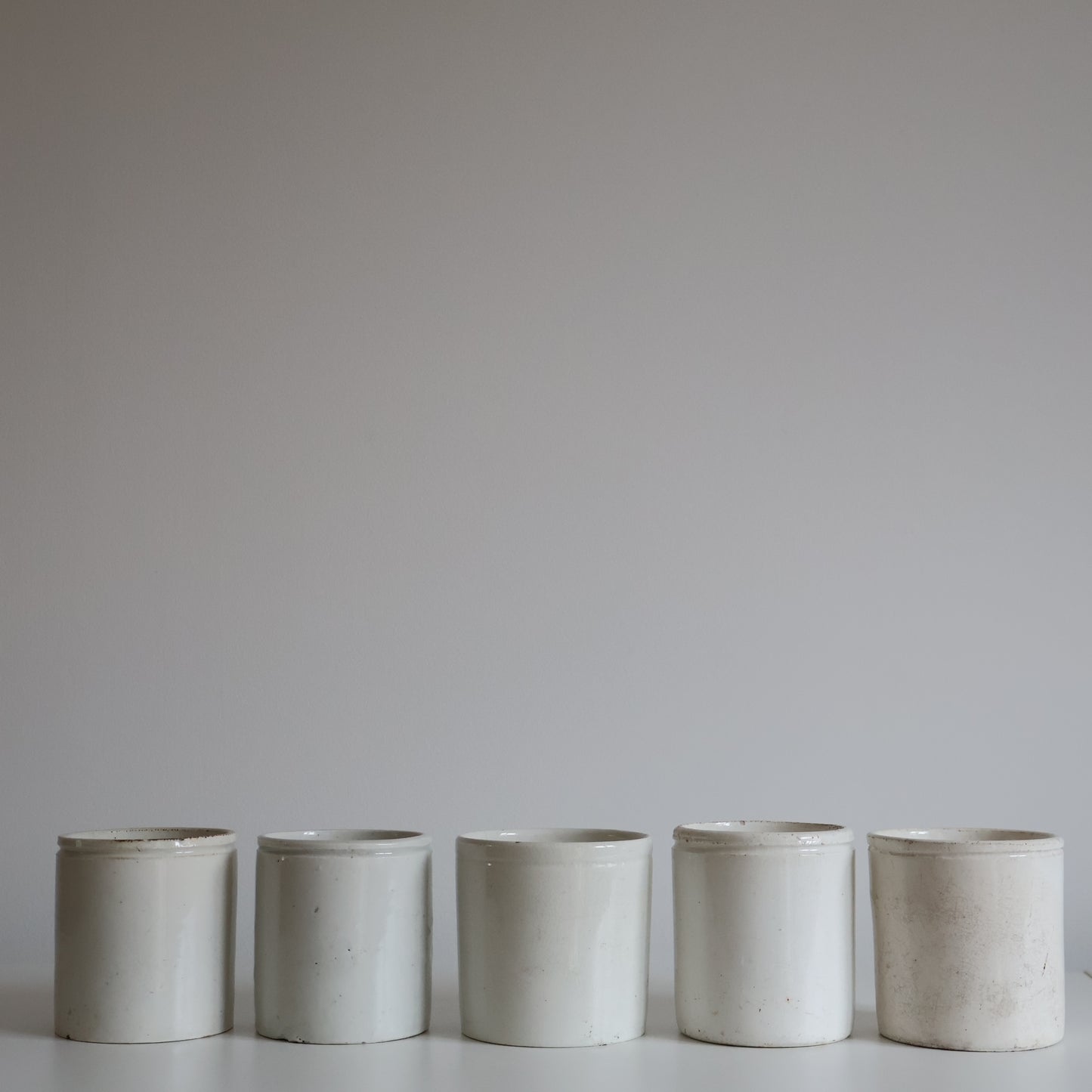 White stoneware jars