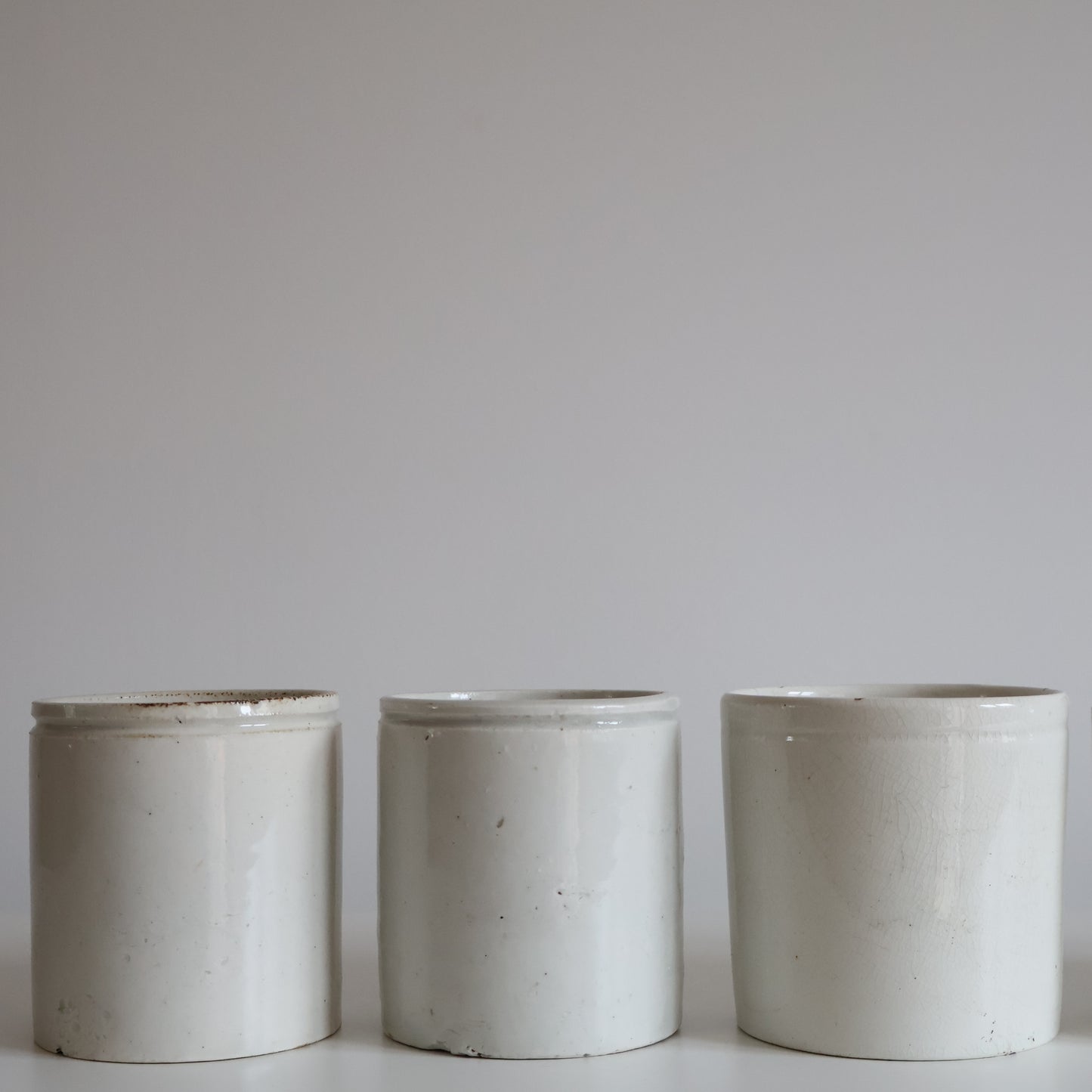 White stoneware jars