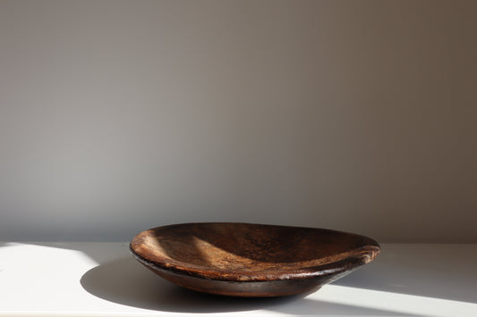 Aged wooden bowl
