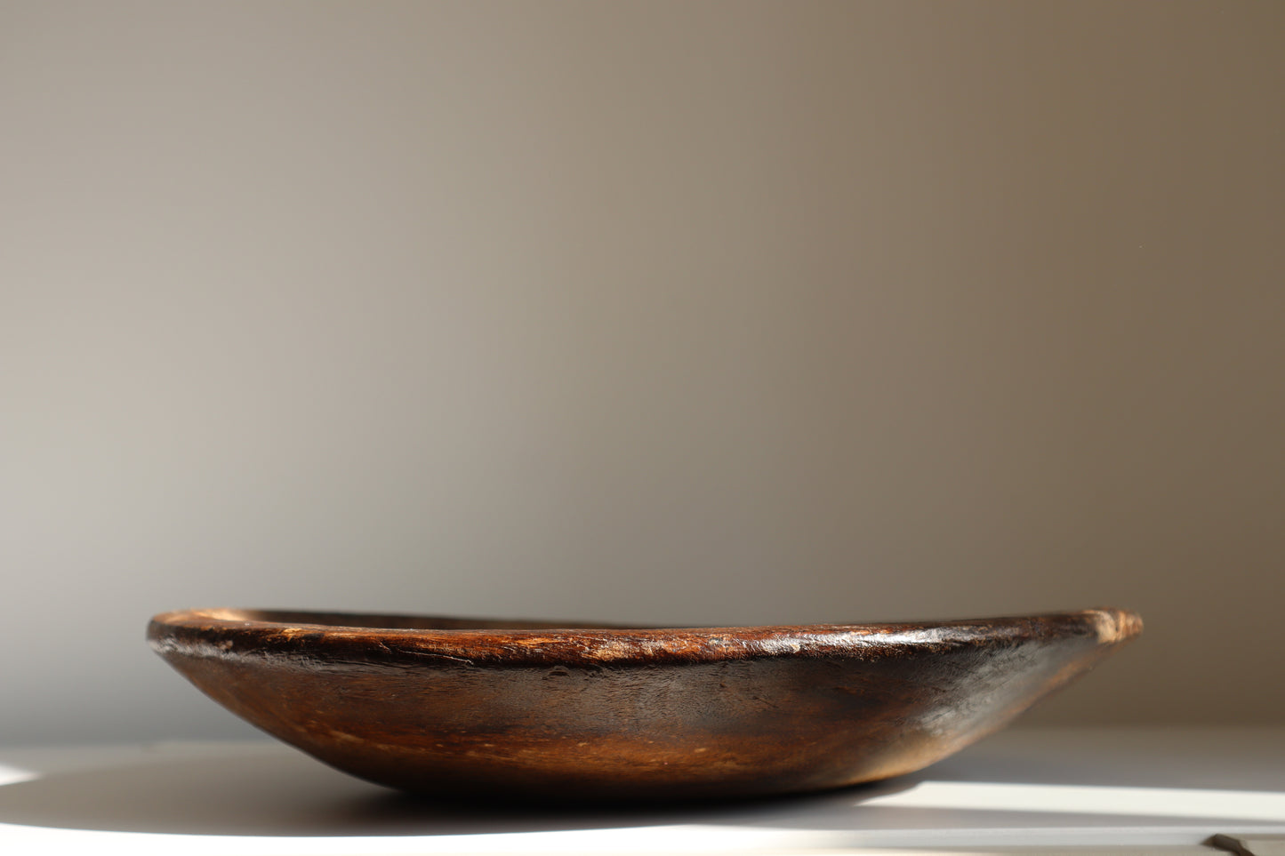 Aged wooden bowl
