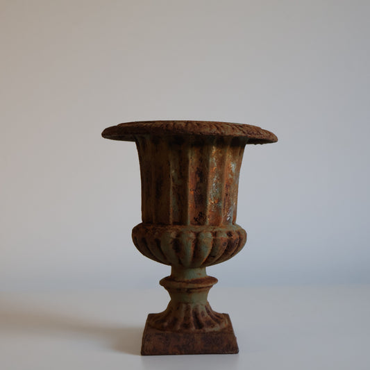 Small cast iron urn