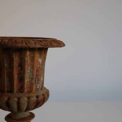 Small cast iron urn