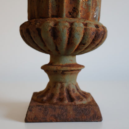Small cast iron urn