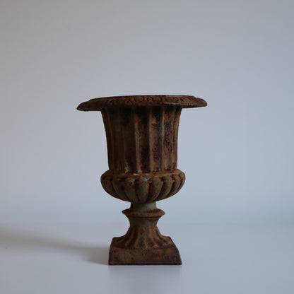 Small cast iron urn