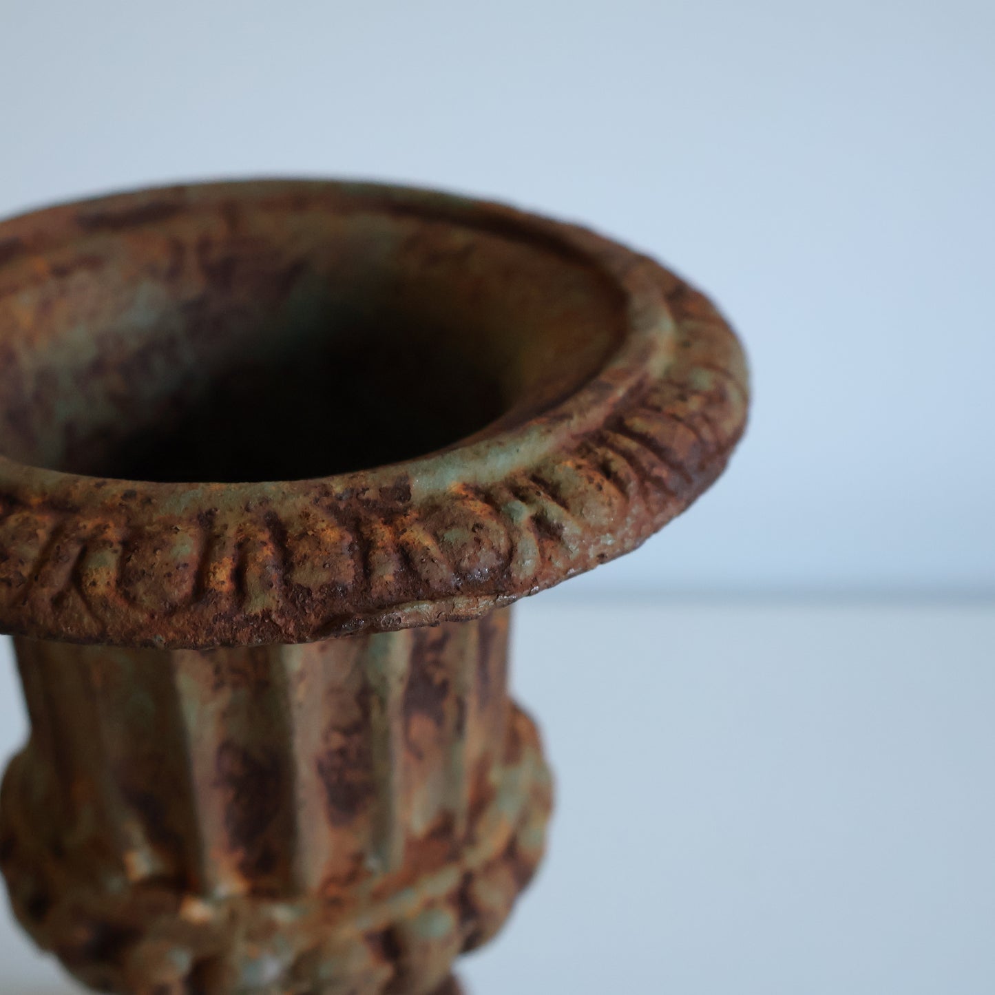 Small cast iron urn